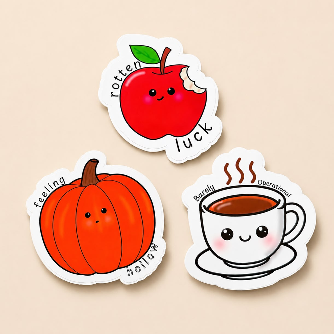 Three die-cut vinyl stickers: rotten luck apple, feeling hollow pumpkin and barely operational coffee cup